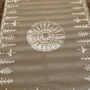 Korhani 53 x 74” outdoor/indoor rug. UV treated to resist fading.  Cream/Mink.